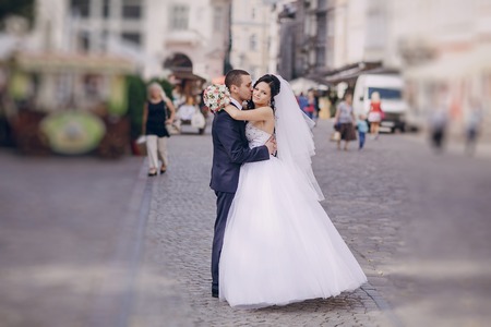 beautiful summer wedding that took place in the old city with wonderful architectureの写真素材