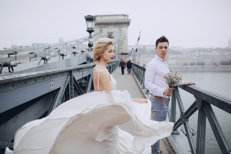 beautiful unique couple walks into your wedding day in Budapestの写真素材