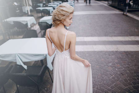 gymnastics the bride posing on the street in Budapestの写真素材