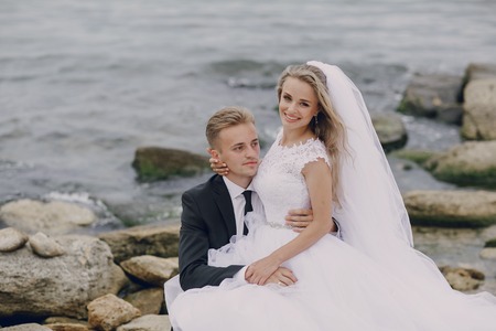 beautiful blonde couple celebrate their wedding dayの写真素材
