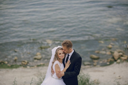 beautiful blonde couple celebrate their wedding dayの写真素材
