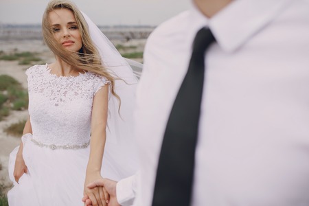 beautiful blonde couple celebrate their wedding dayの写真素材
