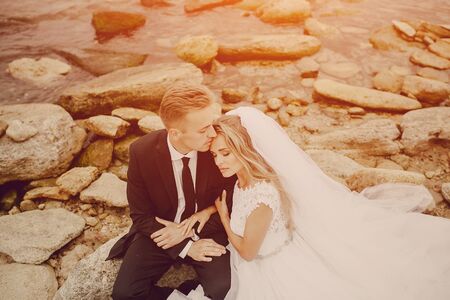 beautiful blonde couple celebrate their wedding dayの写真素材