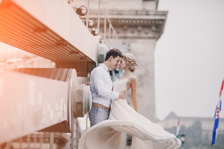 beautiful unique couple walks into your wedding day in Budapestの写真素材