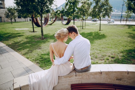 gorgeous wedding couple walking in the old city of Budapestの写真素材