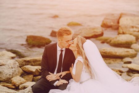 beautiful blonde couple celebrate their wedding dayの写真素材