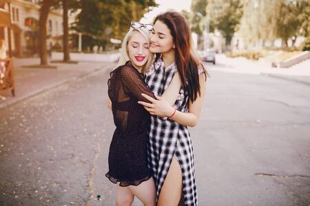 models walk the city, enjoy the gadgets do self and drink cocktailsの写真素材