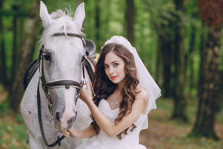 bride with horseの写真素材