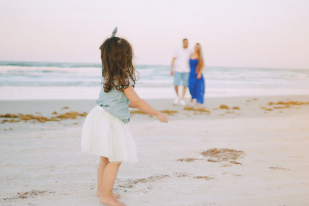beautiful family on the beachの写真素材