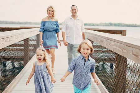 young family on the streetの写真素材