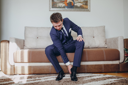 groom preparing morningの写真素材