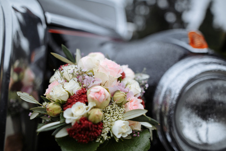 bride and groom's car and flower bouquetの写真素材