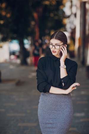 beautiful brunette with glassesの写真素材