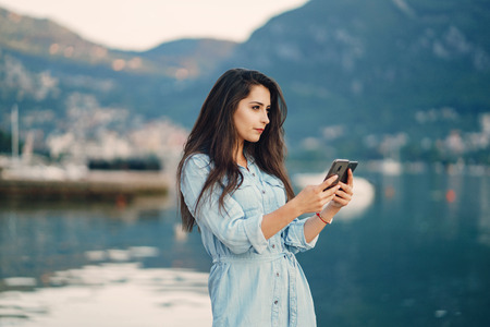 girl by the waterの写真素材