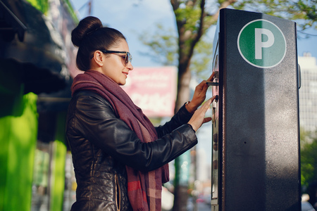 woman pays for Parkingの写真素材