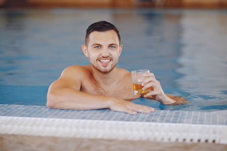 man in the poolの写真素材