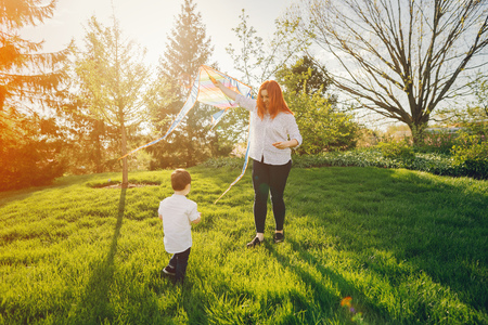 cute family in a sunny parkの写真素材