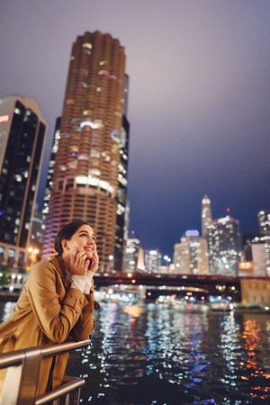 woman walking near Chicago riverの写真素材
