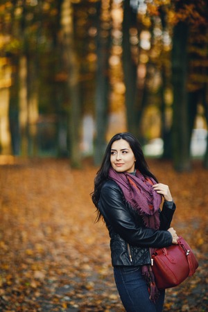 brunette girl relaxing at the parkの写真素材