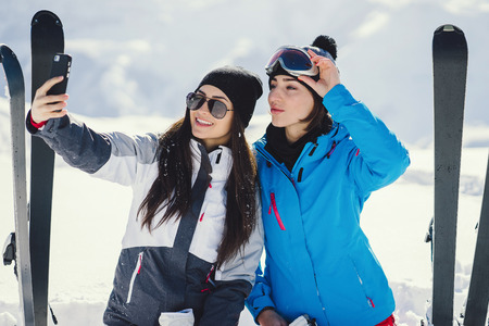 girls with skiの写真素材