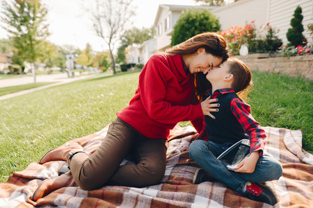Beautiful mother with little sonの写真素材