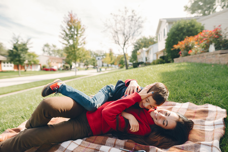 Beautiful mother with little sonの写真素材
