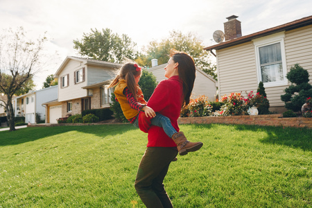 Beautiful mother with little daughterの写真素材