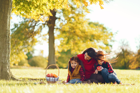 Beautiful mother with little kidsの写真素材