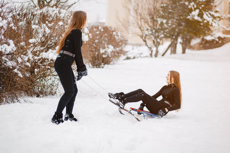 Girls in a winter park