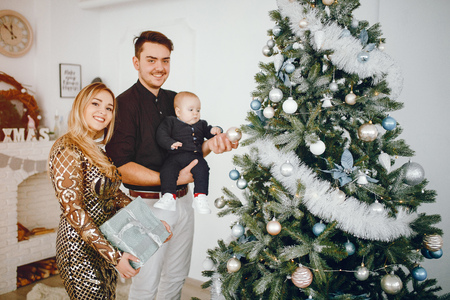 Family near Christmas treeの写真素材