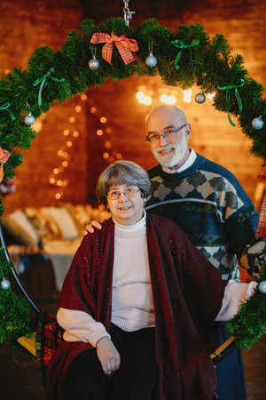 An elegant old couple are celebrating Christmas
