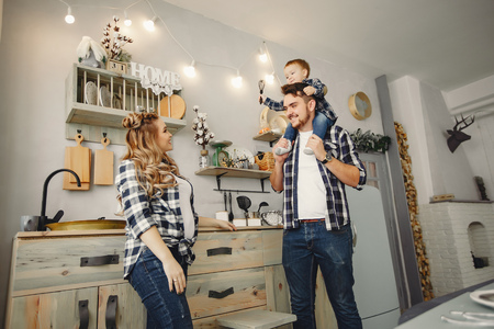 Cute family have fun in the kitchenの写真素材