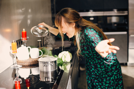Woman in a kitchenの写真素材