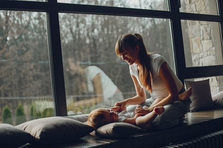 Mother with son at home