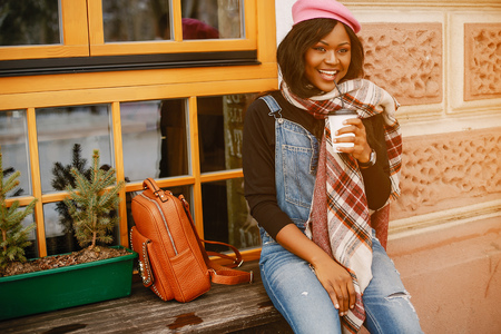 Elegant black girl in a winter cityの写真素材