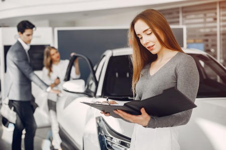 Two stylish woman in a car salonの写真素材