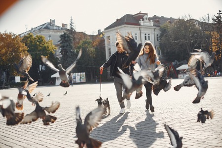 Beautiful couple spend time in a summer cityの写真素材