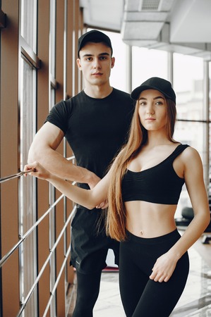 Sports couple in a morning gymの写真素材