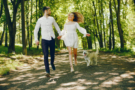 elegant couple in a forestの写真素材