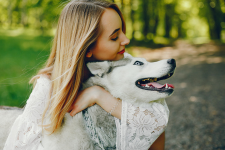 elegant girl with cute dogの写真素材