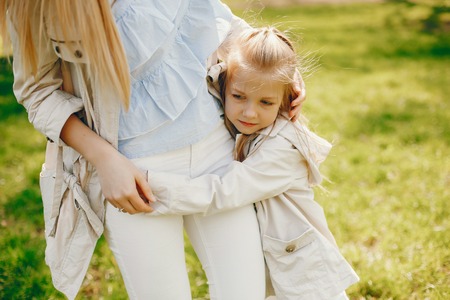 elegant mother with cute daughterの写真素材