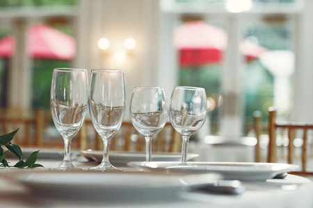 Wedding table with dishes. Classes on a wedding tableの写真素材