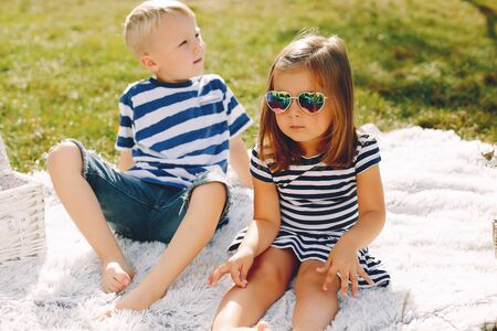 Family in a park playing on a grassの写真素材