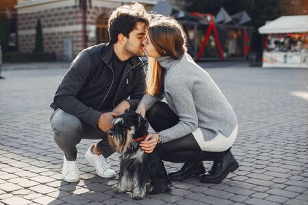 Beautiful couple spend time in a summer cityの写真素材