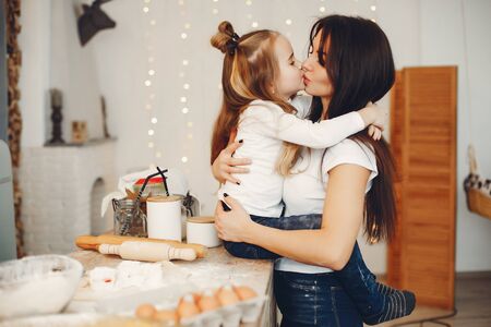 Family cook the dough for cookiesの写真素材