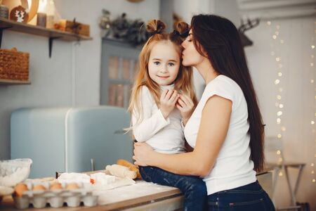 Family cook the dough for cookiesの写真素材