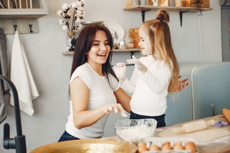 Family cook the dough for cookiesの写真素材