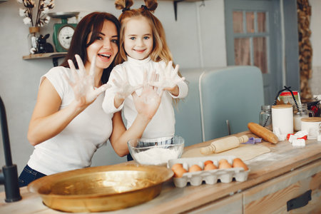 Family cook the dough for cookiesの写真素材