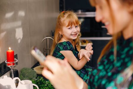 Family in a kitchenの写真素材