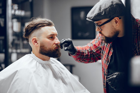 Stylish man sitting in a barbershop